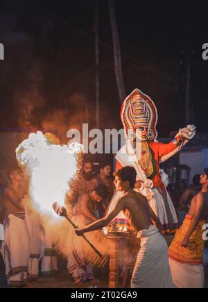 Kerala Folk art form Mudiyettu, Goddess Kali and Darika Fight Stock Photo