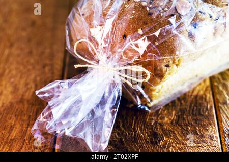 Brazil nut bread, packaged in biodegradable plastic, organic and vegan food made at home Stock Photo