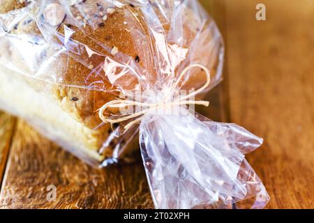 Brazil nut bread, packaged in biodegradable plastic, organic and vegan food made at home Stock Photo