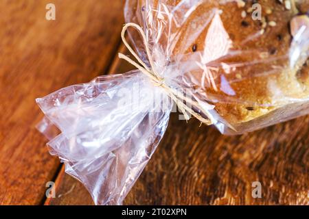 Brazil nut bread, packaged in biodegradable plastic, organic and vegan food made at home Stock Photo