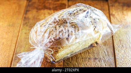 Brazil nut bread, packaged in biodegradable plastic, organic and vegan food made at home Stock Photo