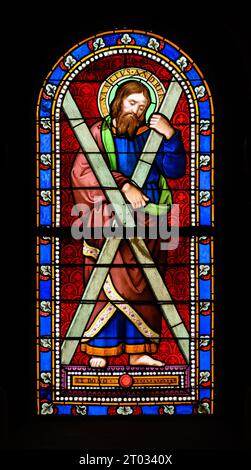Saint Andrew the Apostle. A stained-glass window in Church of St Alphonsus Liguori, Luxembourg City, Luxembourg. Stock Photo