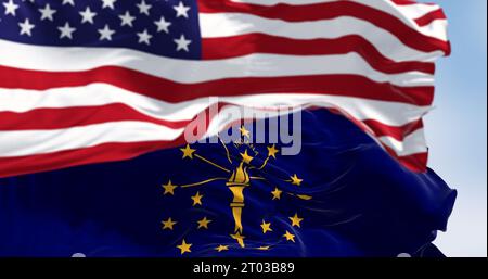 Indiana state flag waving with the national flag of the United states on a clear day. 3d illustration render. Selective focus. Fluttering fabric Stock Photo