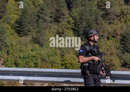 Amidst a fierce confrontation between Kosovan police forces and Serbian gunmen, orchestrated by Milan Radoicic (Chairman of Serbian List), Kosovo Police stand resolute in their mission to uphold security in Banjska Village and the path towards the Jarinje border crossing with Serbia on Tuesday, October 3, 2023. The incident follows a tragic event two weeks ago when gunmen, labelled as terrorists by the Kosovan government, claimed the life of Sergeant Afrim Bunjaku, a dedicated Kosovar Police officer, during the shootout. (VX photo/ Vudi Xhymshiti) Stock Photo