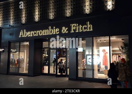 Beijing, China - November 11, 2017:  People shop at night at the Abercrombie & Fitch, an American retailer, in the Sanlitun district known for its int Stock Photo