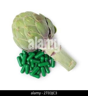 Fresh artichoke and pills isolated on white, top view Stock Photo