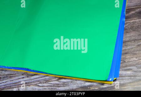 Green cover for booklets, brochures and books, wrapping the coverage on books, back to school concept, school supplies and education background, , col Stock Photo