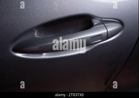 Car gray handle with keyless technology  close up view Stock Photo