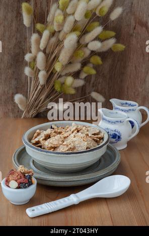 Homemade Gadola, Cereal and Nuts in Ceramic Bowl served with Almond Milk for Healthy Breakfast. Space for text, Selective focus. Stock Photo