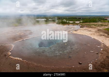 The Geysir Hot Springs in Haukadalsvegur, Iceland During a Summer Day Stock Photo