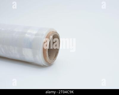 Roll of transparent plastic wrapping on white background Stock Photo
