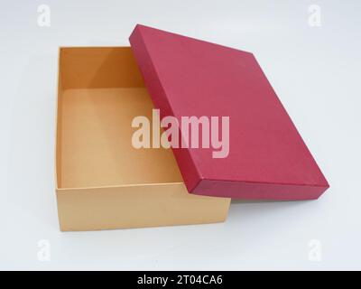 red and brown open gift box isolated on white Stock Photo