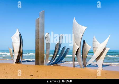 The monumental sculpture 'Les Braves' by Anilore Banon was erected on Omaha Beach in 2004 for the 60th anniversary of the WWII Normandy landings. Stock Photo