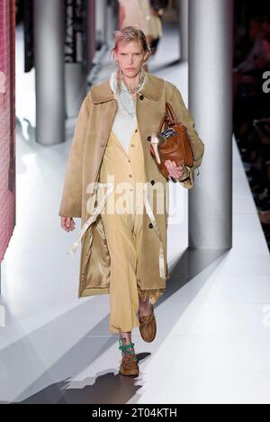 (231004) -- PARIS, Oct. 4, 2023 (Xinhua) -- A model presents a creation of Miu Miu's Spring/Summer 2024 ready-to-wear collections during the Paris Fashion Week, in Paris, France, on Oct. 3, 2023. (MeetEurope/Handout via Xinhua) Stock Photo