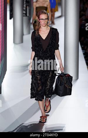 (231004) -- PARIS, Oct. 4, 2023 (Xinhua) -- A model presents a creation of Miu Miu's Spring/Summer 2024 ready-to-wear collections during the Paris Fashion Week, in Paris, France, on Oct. 3, 2023. (MeetEurope/Handout via Xinhua) Stock Photo