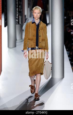 (231004) -- PARIS, Oct. 4, 2023 (Xinhua) -- A model presents a creation of Miu Miu's Spring/Summer 2024 ready-to-wear collections during the Paris Fashion Week, in Paris, France, on Oct. 3, 2023. (MeetEurope/Handout via Xinhua) Stock Photo