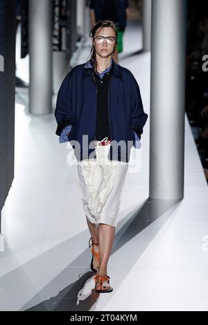 (231004) -- PARIS, Oct. 4, 2023 (Xinhua) -- A model presents a creation of Miu Miu's Spring/Summer 2024 ready-to-wear collections during the Paris Fashion Week, in Paris, France, on Oct. 3, 2023. (MeetEurope/Handout via Xinhua) Stock Photo