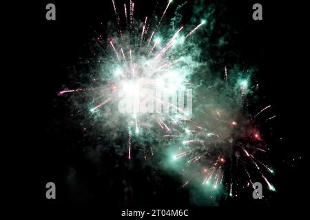 Fireworks in the black night sky Stock Photo