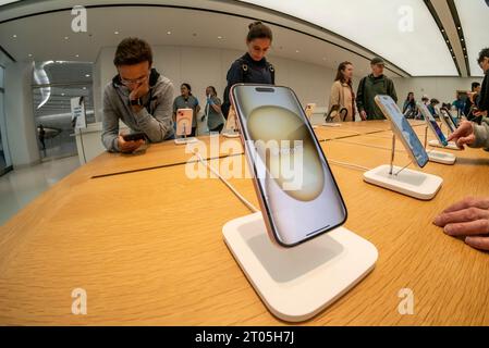 Visitors to the Apple store in the World Trade Center of New York on Sunday, September 24, 2023 browse the various iterations of the recently released iPhone 15.   (© Richard B. Levine) Stock Photo