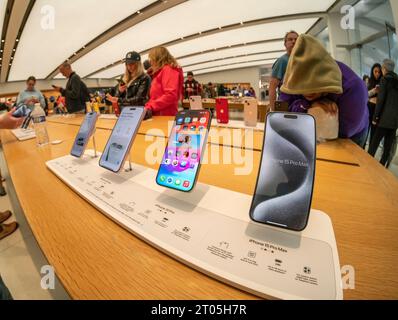 Visitors to the Apple store in the World Trade Center of New York on Sunday, September 24, 2023 browse the various iterations of the recently released iPhone 15.   (© Richard B. Levine) Stock Photo