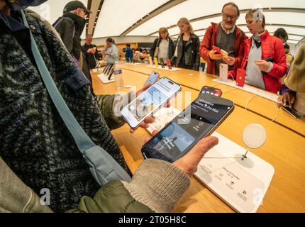 Visitors to the Apple store in the World Trade Center of New York on Sunday, September 24, 2023 browse the various iterations of the recently released iPhone 15.   (© Richard B. Levine) Stock Photo