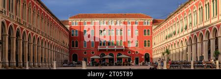 panoramic image of republic square in split on a blue sky sunny afternoon is half shady and half brightly lit Stock Photo