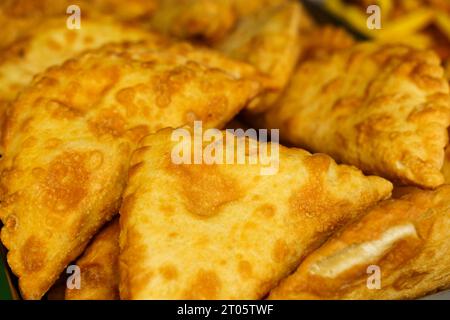 Freshly prepared pasties on the counter of a street cafe. Street food Stock Photo