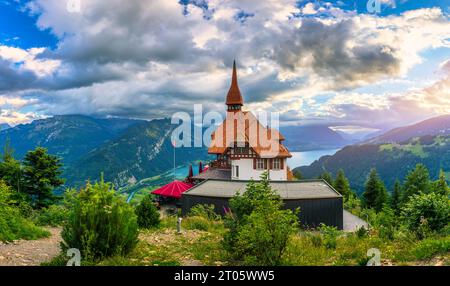 Beautiful top of Harder Kulm in Swiss Interlaken in summer sunset. Turquoise Lake Thun and Brienz in background. Stunning scenery on top of Harder Kul Stock Photo