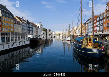 Colorful build and ships along Copenhagen canal. Stock Photo