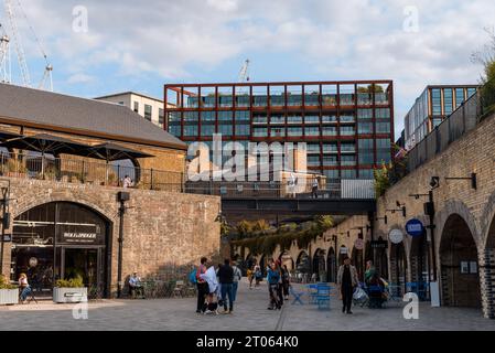 London, UK - August 25, 2023: Coal Drops Yard area in Kings Cross besides Regents Canal Stock Photo