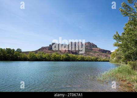 Rocher de Roquebrune and the Argent River in foreground with copy space, Roquebrune-sur-Argens, France, a tourist destination Stock Photo