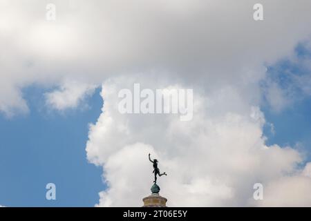 Minimalist view of the Giraldilla, a small statue on top of a colonial fort in Old Havana. The structure is the symbol of the capital city. Stock Photo