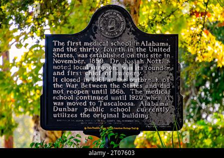 A historic marker stands on the site of the former Medical College of Alabama, Sept. 30, 2023, in Mobile, Alabama. Stock Photo