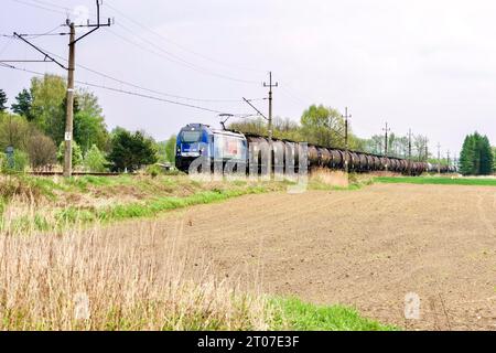 Jaslo, Poland - May 8, 2023: Movement of a freight train on the railway. Stock Photo