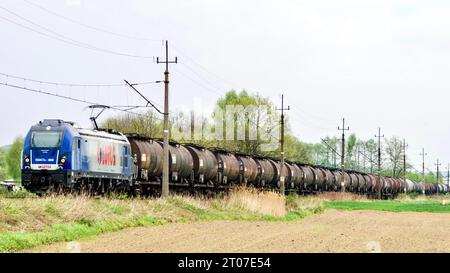 Jaslo, Poland - May 8, 2023: Movement of a freight train on the railway. Stock Photo