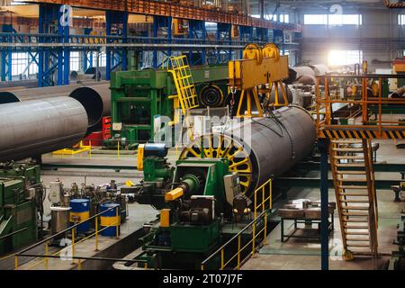 Modern seam pipe factory production line. Stock Photo