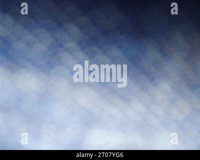 Blue jeans denim fabric abstract texture background pattern blurred macro photo. Stock Photo