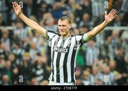 Dan Burn of Newcastle United celebrates scoring his teams second goal ...