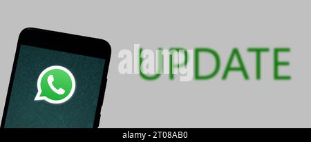 Buenos Aires, Argentina; 10-05-2023: WhatsApp logo on smartphone screen with the word UPDATE on white background. Stock Photo