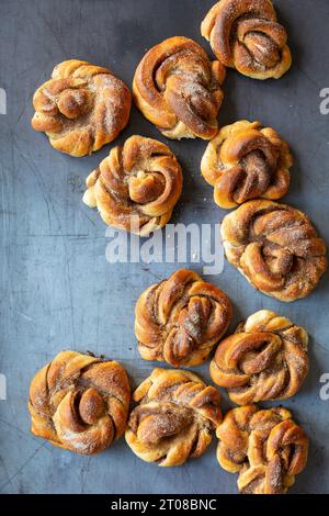 Homemade cinnamon buns on a grey background Stock Photo