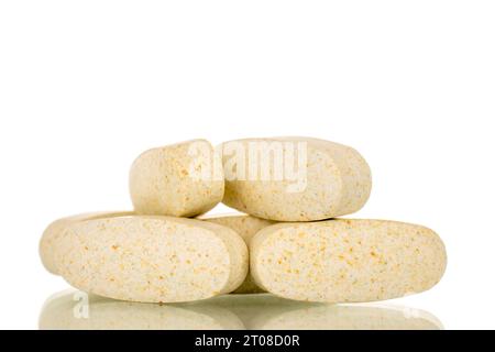 Several medical pills, macro, isolated on white background. Stock Photo