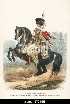 Prince Eugene Beauharnais, stepson of Napoleon, in uniform of a Colonel of the Horse Chasseurs of the Guards, 1781-1824. In hussar-like uniform with fur Busby hat, red pelisse and dolman with gold frogging, cream trousers and red boots, sabretache, armed with a sabre. Horse in leopard-skin shabrack. Le prince Eugene Beauharnais, Colonel des Chasseurs a Cheval de la Garde Imperiale, 1804-1809. Handcoloured woodcut by Quichon after an illustration by Hippolyte Bellangé from P.M. Laurent de l’Ardeche’s Histoire de Napoleon, Paris, 1840. Stock Photo