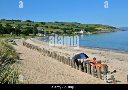 View of beach front in scenic coastal village of Cushendun, County Antrim, Northern Ireland. Stock Photo