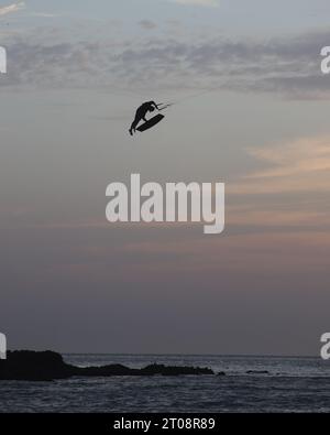 Kitesurfer at sunset in Tarifa, Spain Stock Photo - Alamy