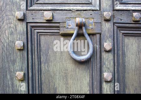 Heavy iron door knocker - John Gollop Stock Photo