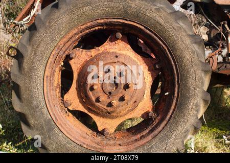 Close-up of an old rusty tractor wheel - John Gollop Stock Photo