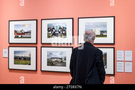 Scottish Portrait Gallery, Edinburgh, Scotland, UK, 05 October 2023, New exhibition: Making Space: Photographs of Architecture. The National Galleries of ScotlandÕs newest exhibition, displays a range of photographic styles, formats and processes. Pictured: a visitor admires photographs by Sylvia Grace Borda of East Kilbride. Credit: Sally Anderson/Alamy Live News Stock Photo