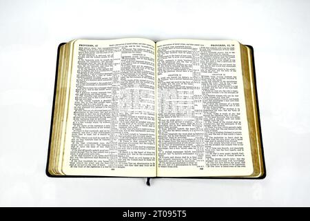 Inside pages of an old bible on a white background Stock Photo