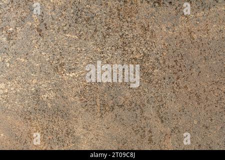 Abstract dark background imitating natural sandstone stone. Stock Photo