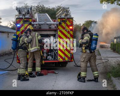 Tuesday 3rd October 2023 - Park Road, Malmesbury, Wiltshire. The local Fire Service attend a car fire outside Huws Gray in Park Road, Malmesbury, Wilt Stock Photo